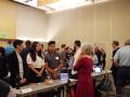 students talking to a judge at the Seawolf Pitch Competition