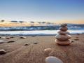 Five stacked rocks at the beach.